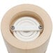 A Chef Specialties Windsor natural maple salt mill with a white circular button on top.