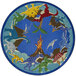 A close-up of a Joy Carpets Kid Essentials Dino Parade round area rug with a picture of green dinosaurs.