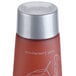 An Ecossential Naturals hotel and motel conditioner bottle with a plastic cap.