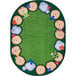 A multicolored oval rug with a green border and a tree and flower design on a white background.