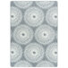 A grey and white Joy Carpets area rug with a circular pattern of white flowers.