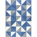 A blue and white Joy Carpets area rug with a triangle pattern.