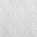 A white jacquard matelasse fabric with a diamond pattern.