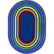 A multicolored oval rug with rainbow stripes.