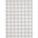 A white and grey houndstooth rug with a checkered pattern.