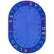 A multicolored oval area rug with letters and numbers in blue.