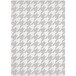 A white and grey houndstooth rug with a checkered pattern.