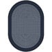 A white oval area rug with a navy braided border.