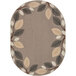 An oval neutral rug with leaves on it.