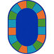A blue oval rug with colorful squares.