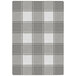 A grey and white plaid Joy Carpets area rug with a white border.