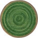 A green circular pattern on a round pine area rug.