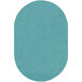 A seafoam blue oval area rug.