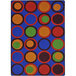A blue area rug with colorful circles on it.