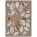 A neutral rectangular area rug with leaves and dots in brown and beige.