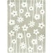 A linen rectangular area rug with grey and white flowers on it.