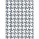 A close-up of a grey and white houndstooth Joy Carpets area rug.