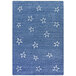 A blue rug with white stars on it.