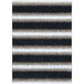 A close-up of a Joy Carpets rectangular area rug with black and white stripes and a brown stripe.