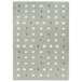 A linen area rug with grey and white dots.