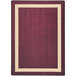 A Joy Carpets heather rectangular area rug with a beige border.