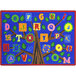 A white rectangle area rug with a colorful tree and letters on it.