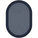 A close up of a navy oval rug with a braided pattern and blue border.