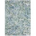 A sea green rectangular area rug with a blue and green pattern.