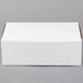 A white rectangular Donut / Bakery Box on a grey background.