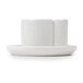 A white rectangular object with a white border on a white plate.