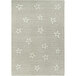 A linen rectangular area rug with grey and white stars on it.