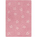 A blush rectangular area rug with white star pattern.