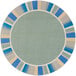 A round sage rug with a blue and yellow border.