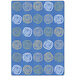 A pastel blue rectangular area rug with white and orange swirls and circles.