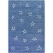 A blue rug with white stars on it.