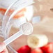A spoon of Add A Scoop Antioxidant Blend supplement powder.