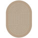 A close-up of a beige Joy Carpets oval area rug with a circular design.