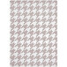 A taupe houndstooth rug with a pattern.