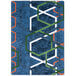 A blue rug with orange and white geometric shapes.