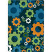 A Joy Carpets Kid Essentials citrus area rug with colorful gears on it.