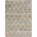 A close up of a Joy Carpets Hazelwood rectangle area rug with a beige and grey geometric trellis pattern.