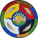 A multicolored circular rug with the words peace, wisdom, and love in a sun design.