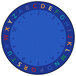 A multicolored round area rug with letters and numbers in a blue circle.