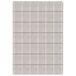 A beige rectangular area rug with squares on it.
