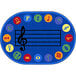 A blue oval area rug with a yellow music note in a red circle and colorful symbols.