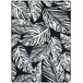 A close-up of a Joy Carpets black and white rug with white leaves.