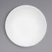 A Cal-Mil Sedona white melamine bowl with a textured rim.