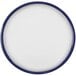 A white round melamine serving tray with a blue rim.