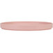 A Cal-Mil blush pink melamine plate with a low circular rim.