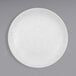 A Cal-Mil Sedona white melamine plate with a textured pattern.